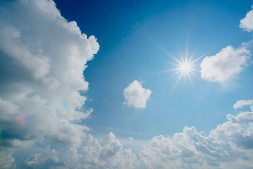 sun shining through clouds