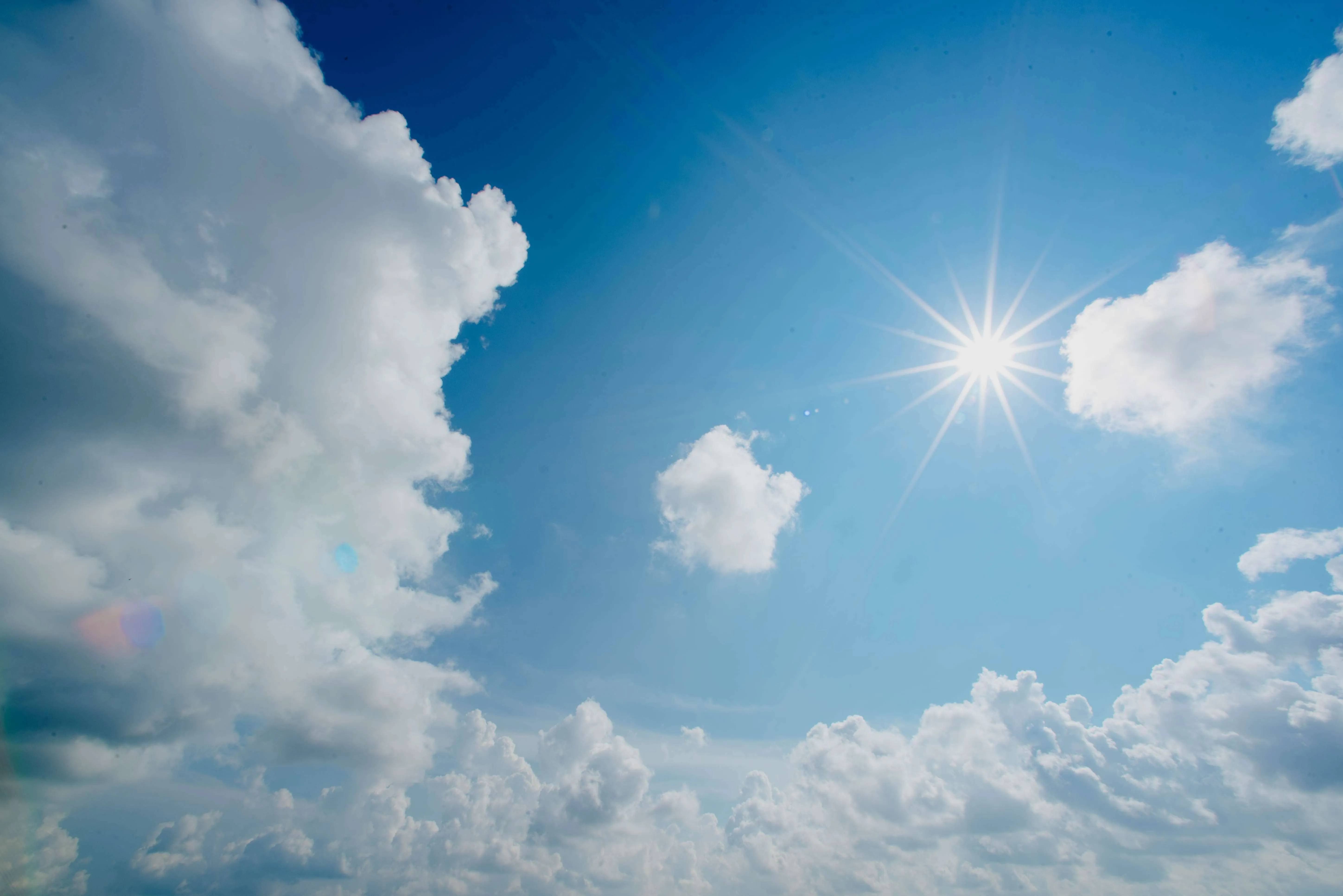 sun shining through clouds